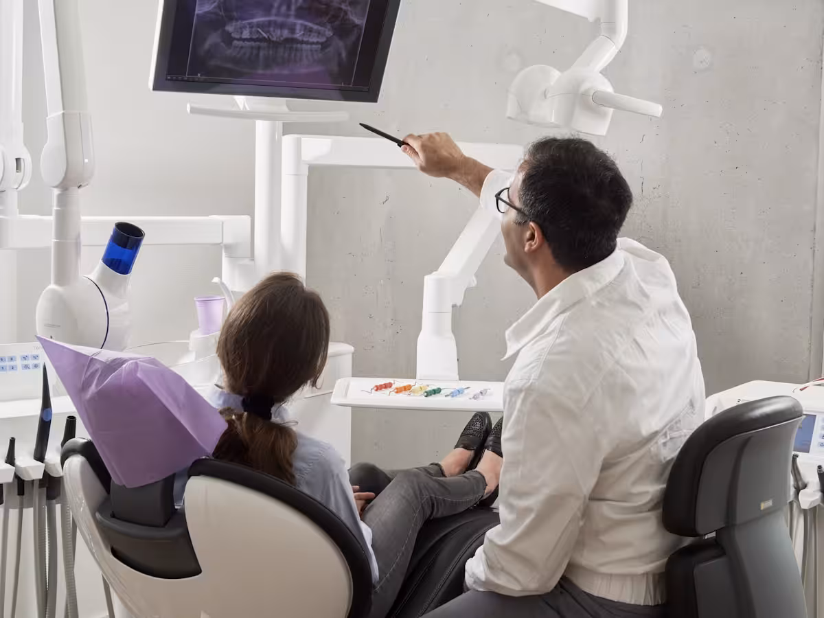 Orthodontic 3D scan rendered on a monitor in a modern clinic.